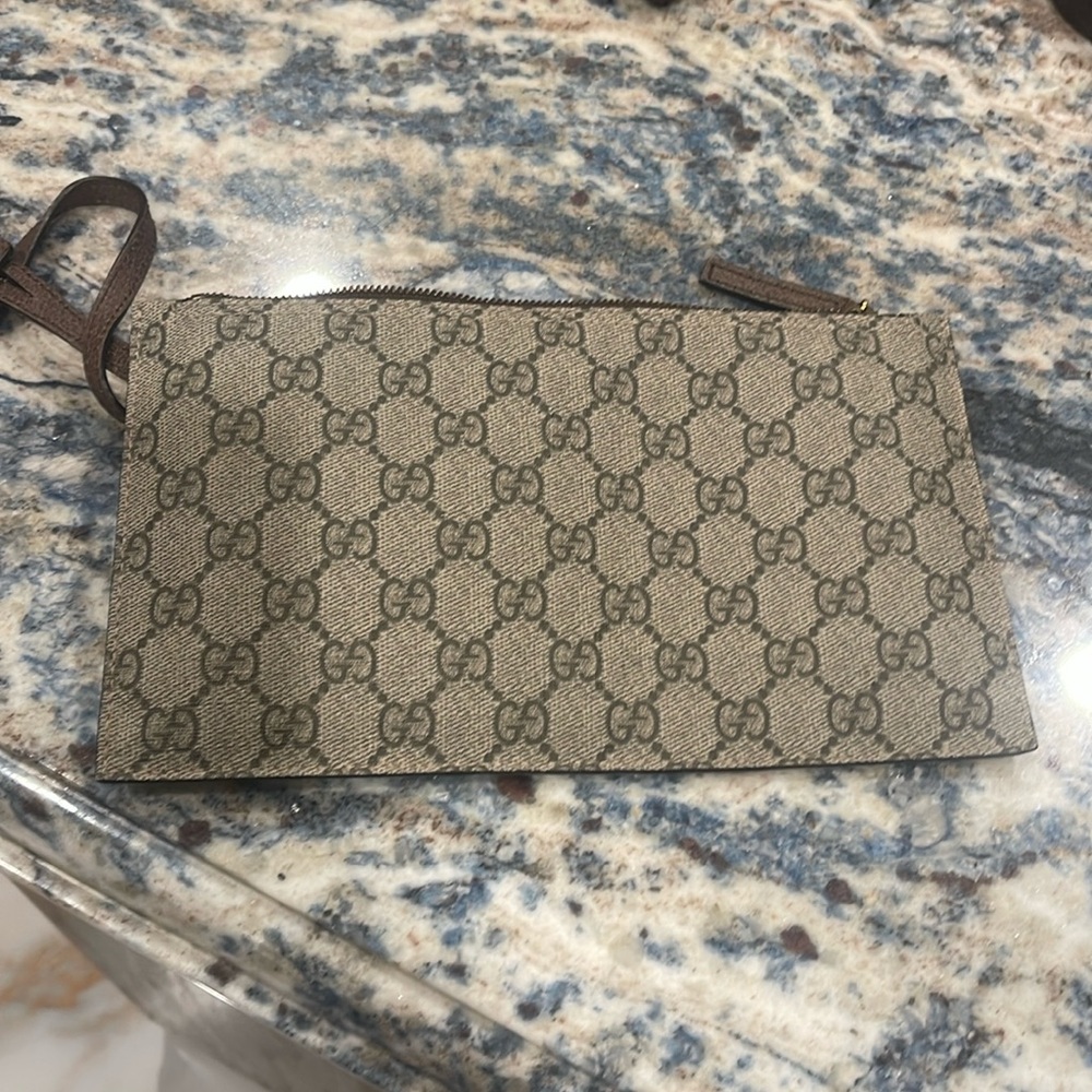 Gucci Brown Monogram Wristlet authentic
